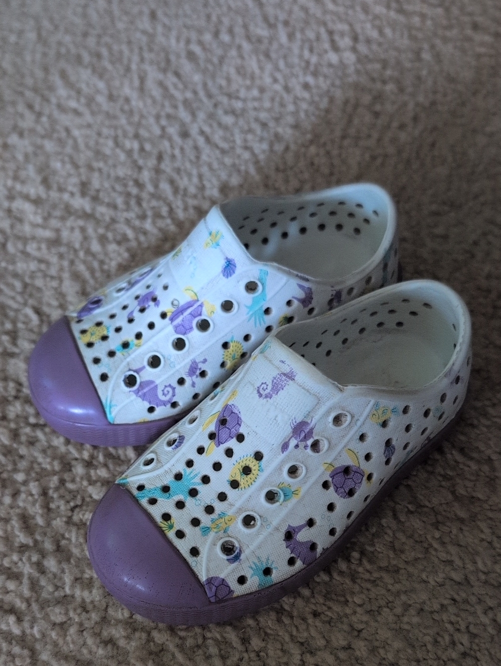 Native Kids White Water Shoes with Purple Accents and Floral Print